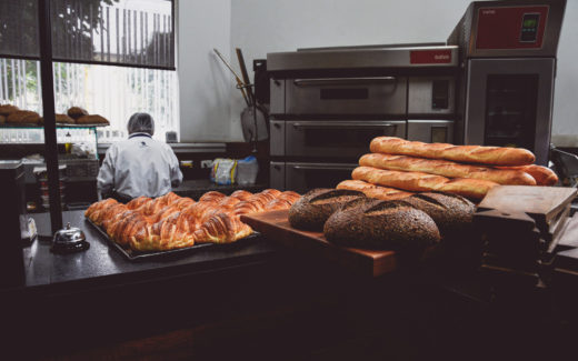 Fresh-baked breads on display at Cafe de Lima